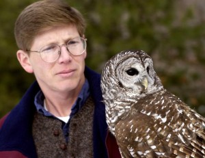 Scott Weidensaul, a nature author from Schuylkill County, handles a barred owl at Hawk Mountain Sanctuary in Albany Township. 2/11/03 Photo by Bill Uhrich